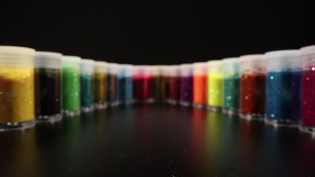 Multicolored glitter for nail design in jar