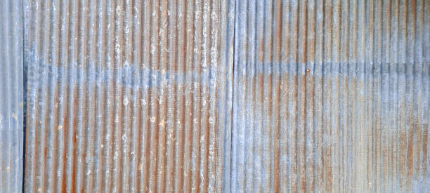 istock Old zinc wall texture background, Texture of rusty galvanized metal roof sheets 1714027523