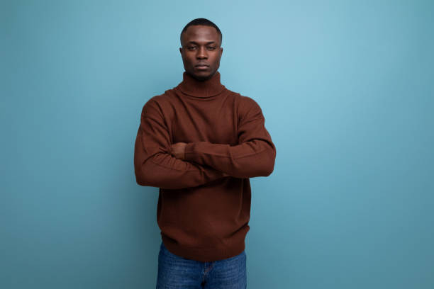 istock serious young ethnic african businessman on studio background 1714035176