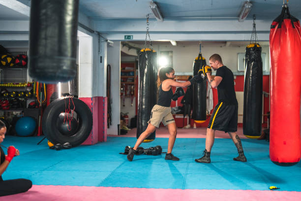 istock Latin Female Boxer Practicing In A Gym 1714038061