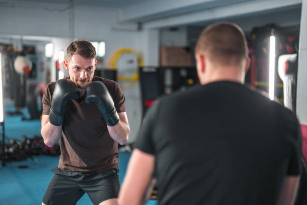 istock Caucasian Males At Boxing Practice 1714038073