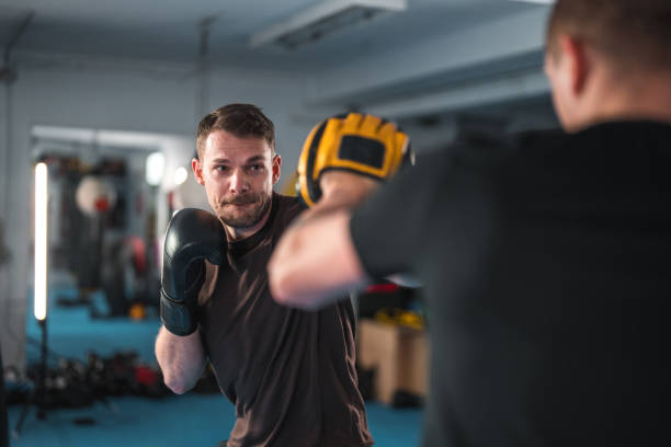 istock Caucasian Male Practicing New Boxing Sequences In A Gym 1714038074