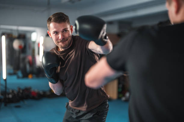istock Caucasian Males At Boxing Practice 1714038080