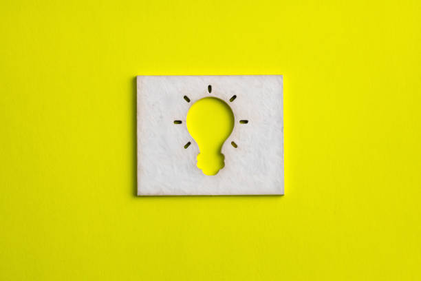 istock Light bulb on yellow color background - Creativity and innovation concept, graphic resource for design 1714074181