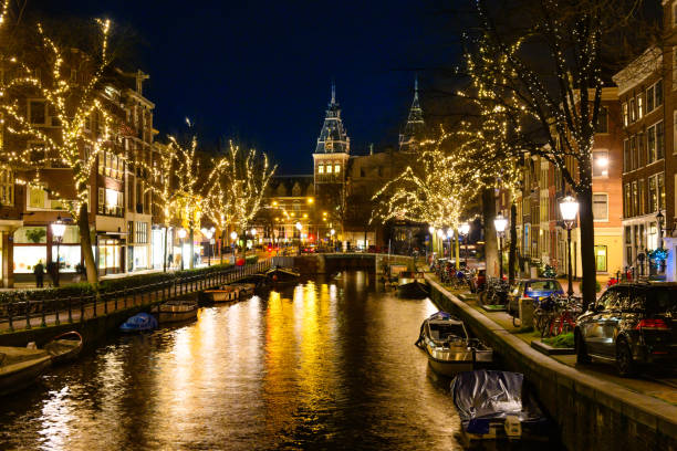 istock Amsterdam Canal Bridge Illuminated at Night in Winter 1714087365