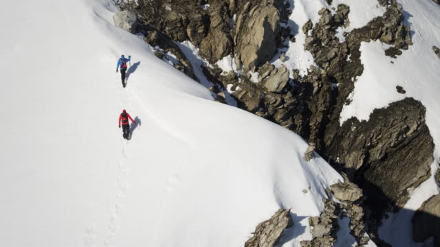 Climbers on a snow-covered mountain