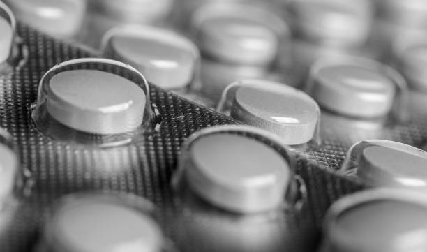 istock medical pills on black and white background 1714115795