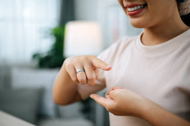 istock Asian woman watching lesson sign language online course communicate by conference video call from home 1714141232
