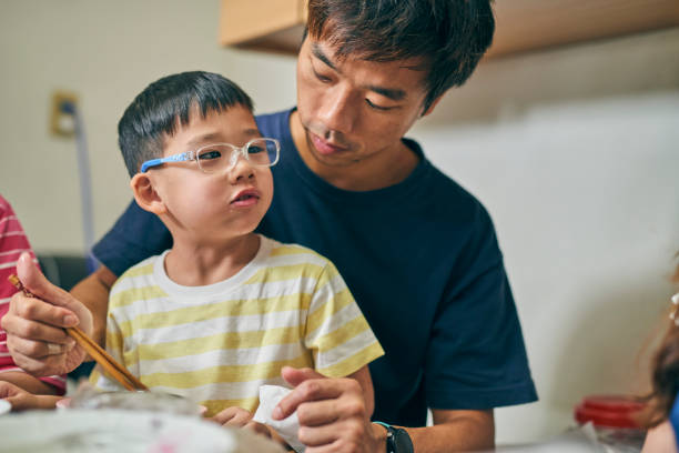 istock An multi-generation Asia family eat dinner together. 1714198207