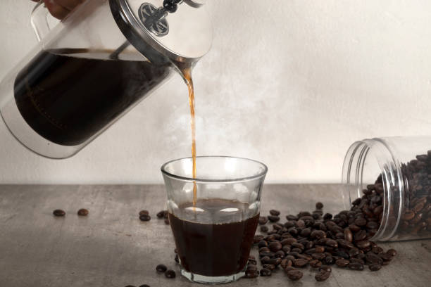 istock A cup of coffee and a French press coffee maker 1714293203