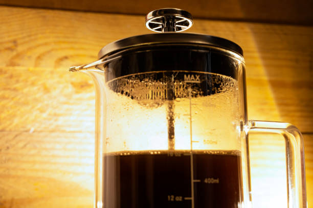 istock Fresh coffee in a French press coffee maker 1714300336