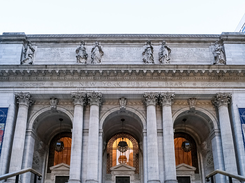 New York – May 2023 – Architectural detail of the New York Public Library (NYPL), a public library system in New York City. It’s the second largest public library in the United States (behind the Library of Congress) and the fourth largest in the world.