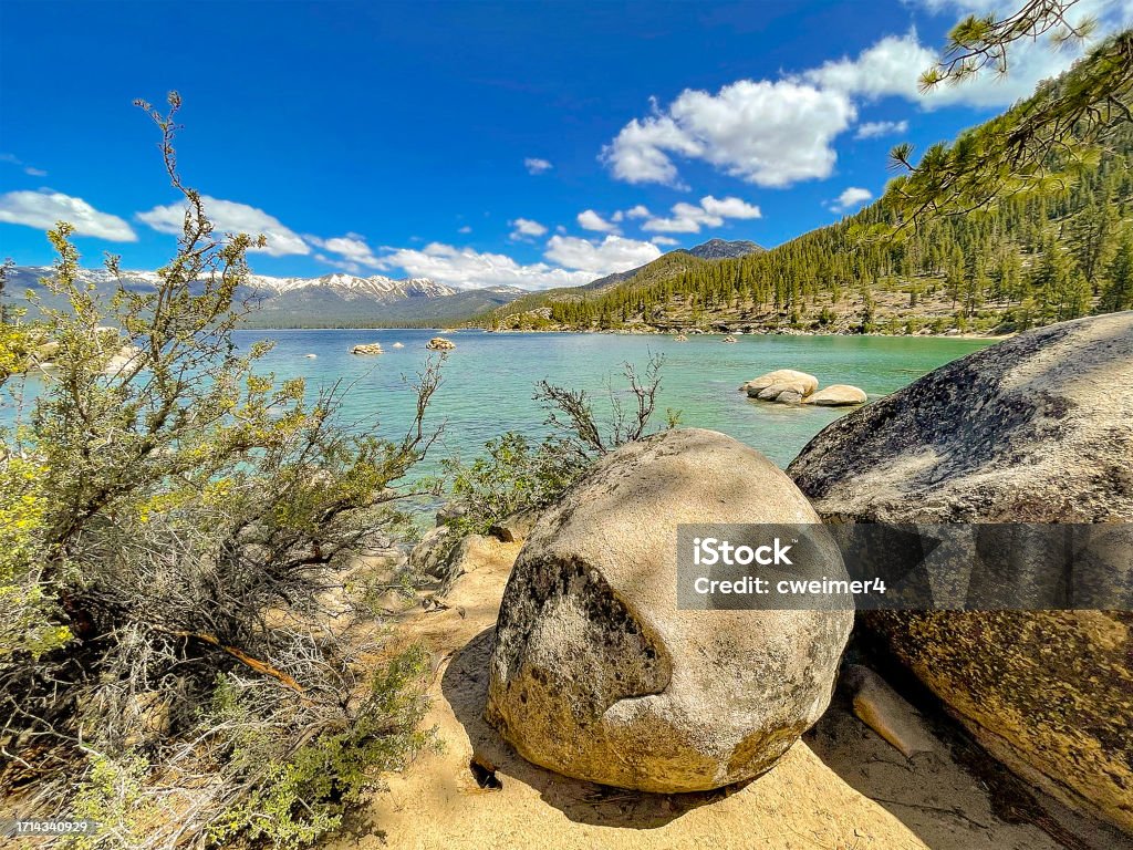 Rocky Shore of Lake Tahoe A view of Lake Tahoe from the Rocky shoreline. No People Stock Photo