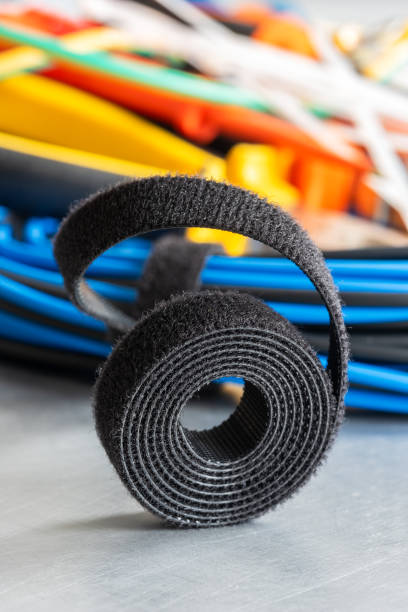 istock Roll of hook and loop velcro tape used to organize cable in electrical installations 1714360029