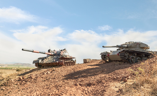Qatzrin, Israel, September 16, 2023 : Syrian and Israeli tanks destroyed during the Yom Kippur War are in the Valley of Tears at the OZ 77 Tank Brigade Memorial on the Golan Heights in northern Israel
