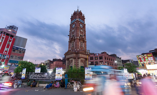 This captivating photograph captures the iconic Faisalabad Clock Tower, formerly known as the Lyallpur Clock Tower, during the enchanting \