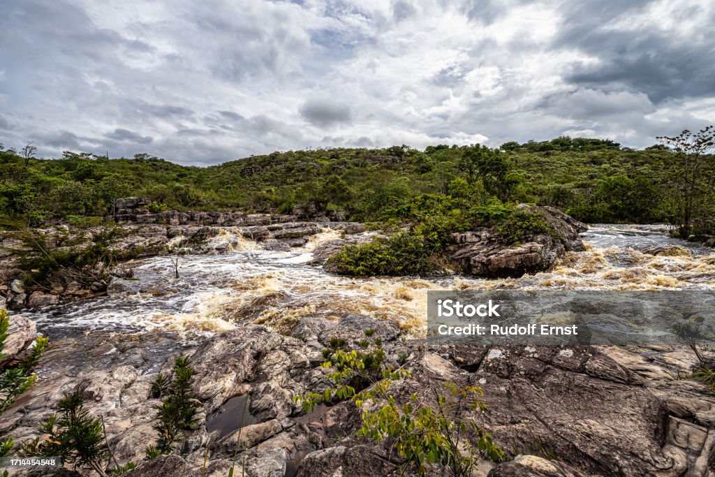 The river Mucugezinho in Chapada Diamantina, Bahia, Brazil with running water, forming a waterfall and Poco do Pato View of the river Mucugezinho with running water, forming a waterfall and Poco do Pato, in Chapada Diamantina, Bahia, Brazil Bahia State Stock Photo