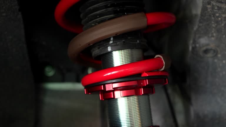 Car coiled spring and Shock absorber for service at the auto repair shop