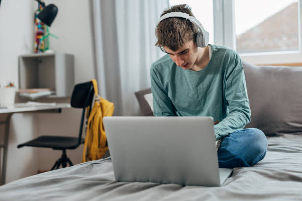 istock teenager student at home 1714468927
