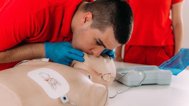 istock AED first aid resuscitation course. Life saving skills in a first aid resuscitation course using an AED 1714477627