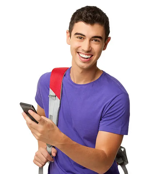 Portrait of happy young male college student using a cell phone. Horizontal shot. Isolated on white.