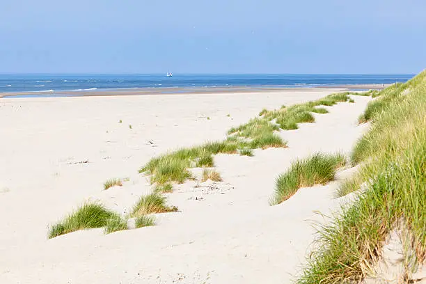 "A nearly white beach at the North Sea in Norderney, Germany."