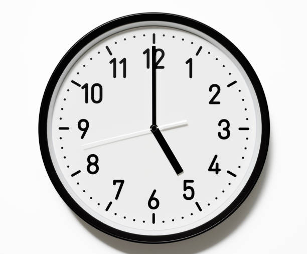 With CLIPPING PATH.Clock face isolated on a white background with clipping path.Studio shot.