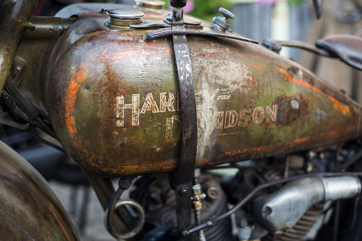 Pfaffenheim- France -  - 1 October 2023 - Closeup of rusty tank of Harley Davidson motorbike in outdoor