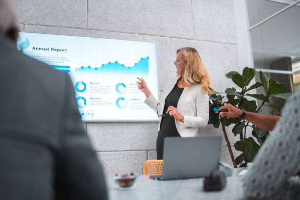 istock Mature Businesswoman's Expert Presentation in a Modern Boardroom 1714546203