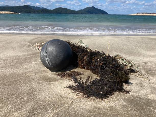 istock Nets and buoys found on a beach in Japan 1714554866
