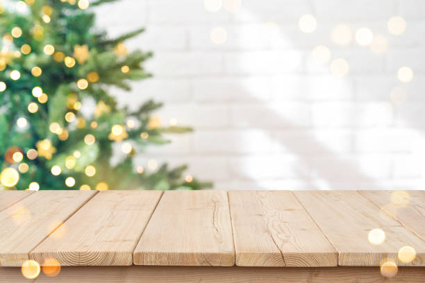 istock Christmas and new year background with empty wooden deck table 1714555949