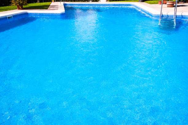 istock A pool with a metal ladder to access it and bathe in summer. 1714566548
