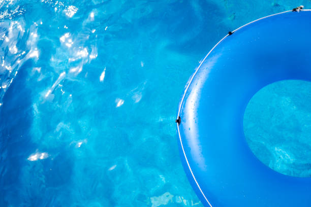 istock A large blue round float on a pool of transparent water, copy space. 1714567615