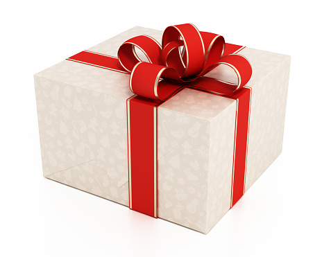 White gift box tied with a gold ribbon bow.  Isolated on white with clipping path.