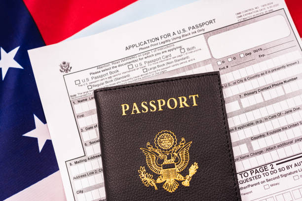istock Application form to get a new American passport, patriotic flag background. 1714580839
