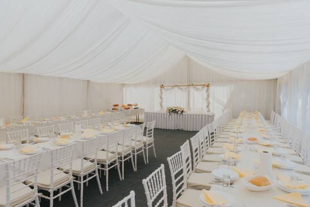 istock Beautiful and romantic interior view of a wedding reception tent. 1714596927