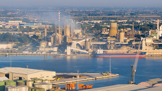 Aerial shot of industrial and port area of Ravenna,production district is made up of a chemical and petrochemical pole, thermoelectric and metallurgical plants.