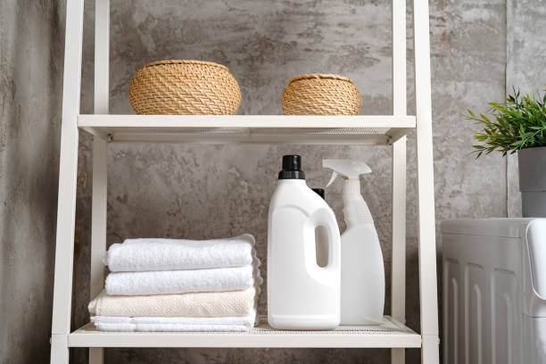istock Clean folded towels on shelf in a bathroom 1714626789