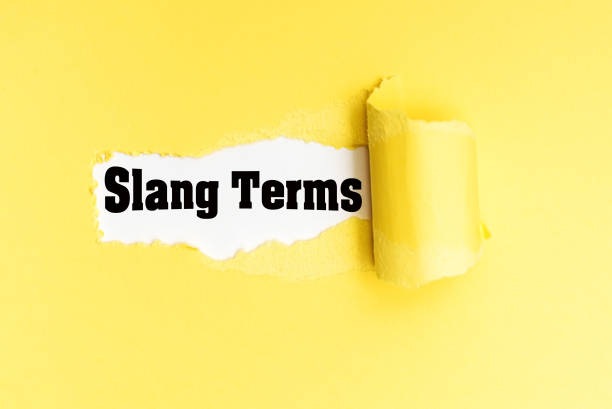 istock English phrase Slang Terms written on torn yellow paper. 1714637391