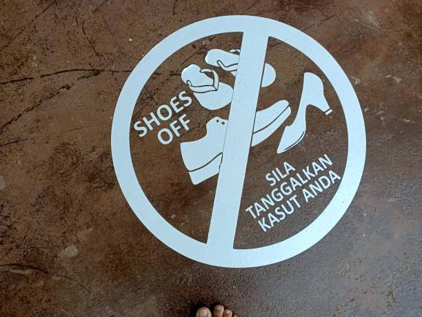 No shoe sign in a building corridor.shoe off.photo taken in malaysia