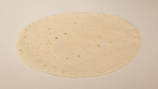 istock Corn tortillas on white background. Unleavened bread 1714650436