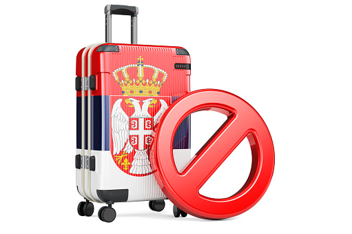Serbia Entry Ban. Suitcase with Serbian flag and prohibition sign. 3D rendering isolated on white background