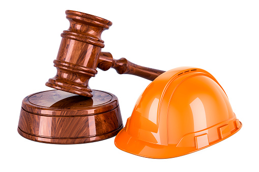 Wooden gavel with orange hard hat, 3D rendering isolated on white background