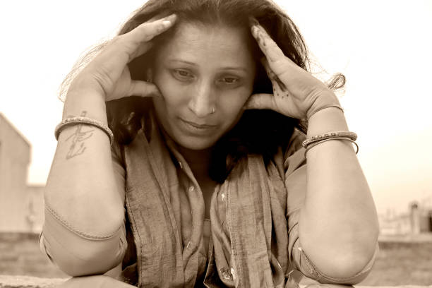 istock Mature women feeling unwell by headache 1714678402