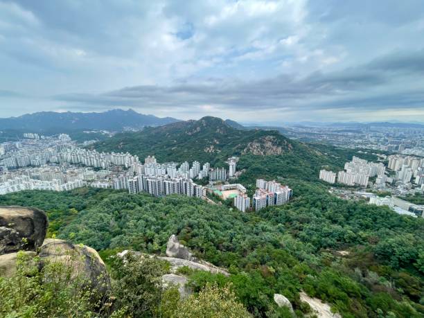 istock Mountains and Apartments in Seoul 1714701943