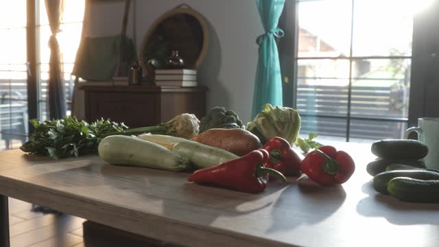 Various colorful veggies arranged on a table in a home