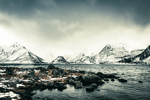 Scenic view over the Austnesfjorden in a winter landscape in the Lofoten archipel in Norway.