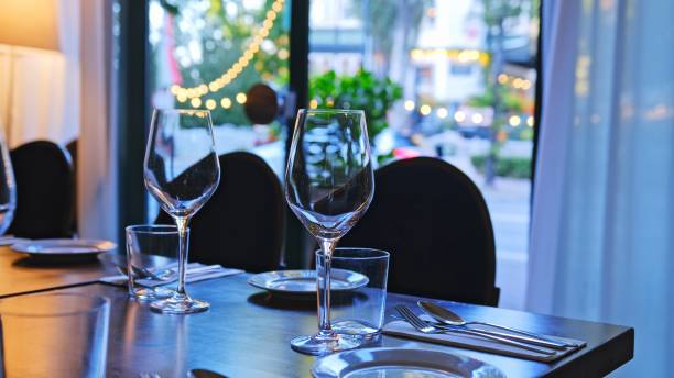 istock Tableware and Wine Glasses Set for Dinner in Tiny Cosy French Style Restaurant 1714747573