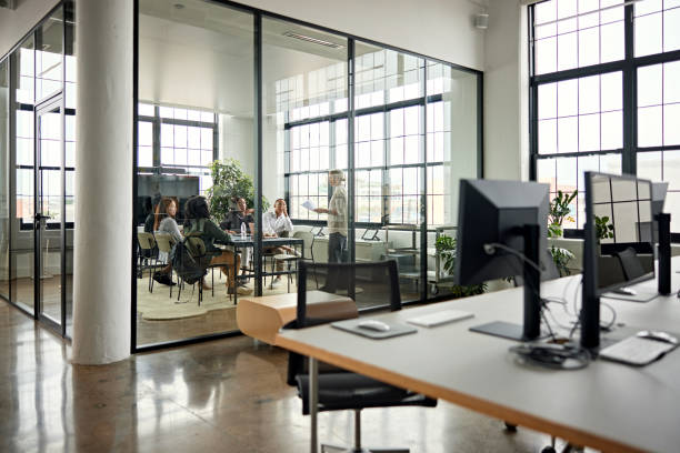 istock Creative director presenting ideas to team in meeting room 1714770537
