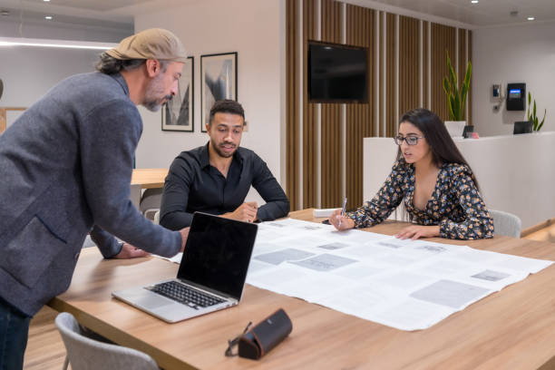 istock Coworkers during a brainstorm in a meeting 1714771651